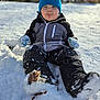 Ryder joined the competition — help win amazing prizes! blue_hat, bokeh, boots, child, cold, jacket, mittens, outdoors, playful, pom_pom, portrait, pouting, rosy_cheeks, sitting, snow, snowsuit, sunlight, toddler, winter_clothing, winter_day