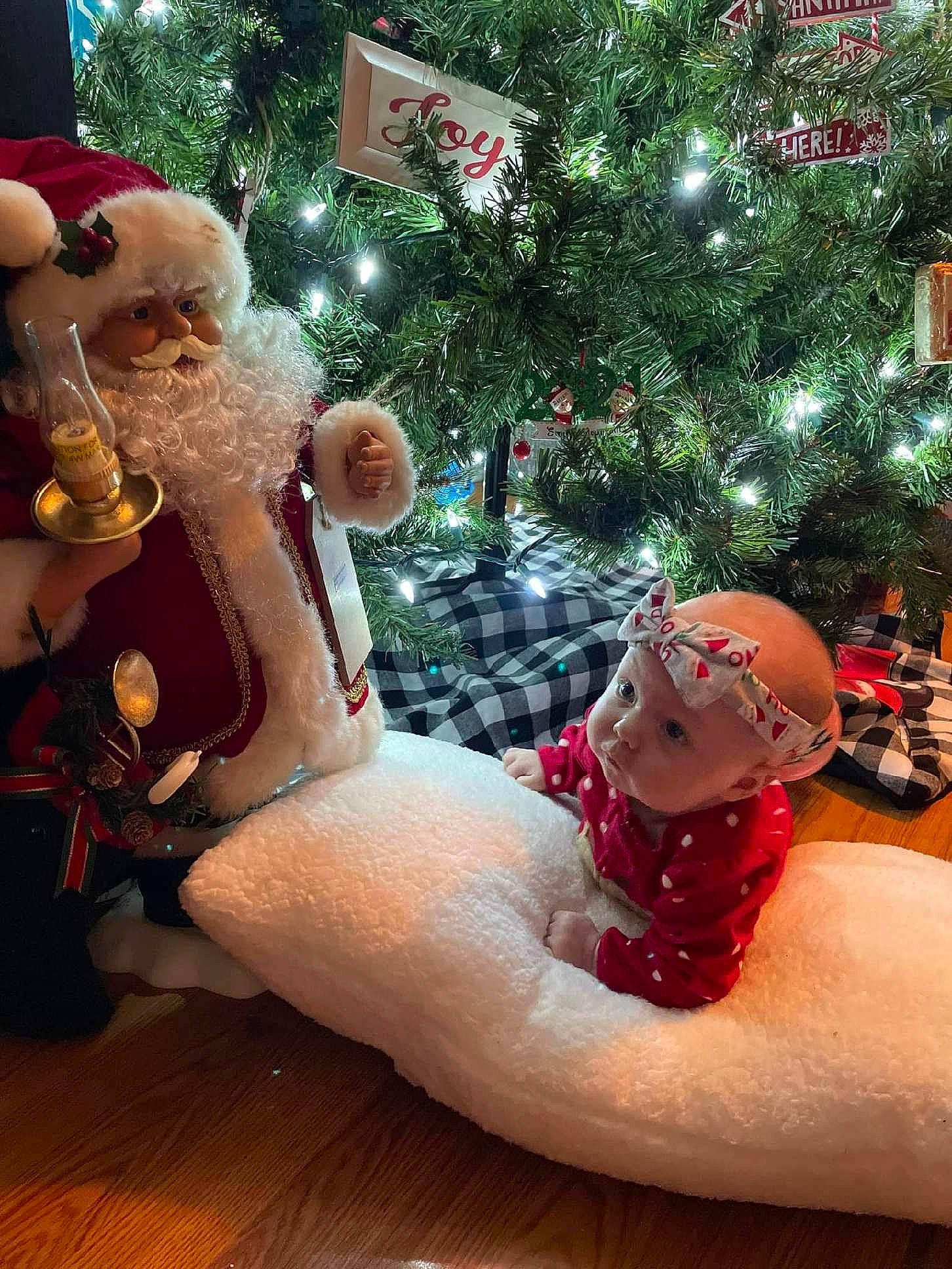 Serenity is registered to the contest to win money with this photo: christmas_decoration, christmas_ornament, christmas_tree, conifer, event, evergreen, fawn, fictional_character, fun, goggles, happy, headwear, holiday, holiday_ornament, human_body, ornament, person, santa_claus, toy, tree