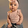 Wrynlee joined the competition — help win amazing prizes! adorable, baby, child, clothing, cute, denim_pants, expression, fashion, female, flower, headwear, infant, innocent, pink_headband, portrait, sitting, smiling, soft_lighting, studio, young