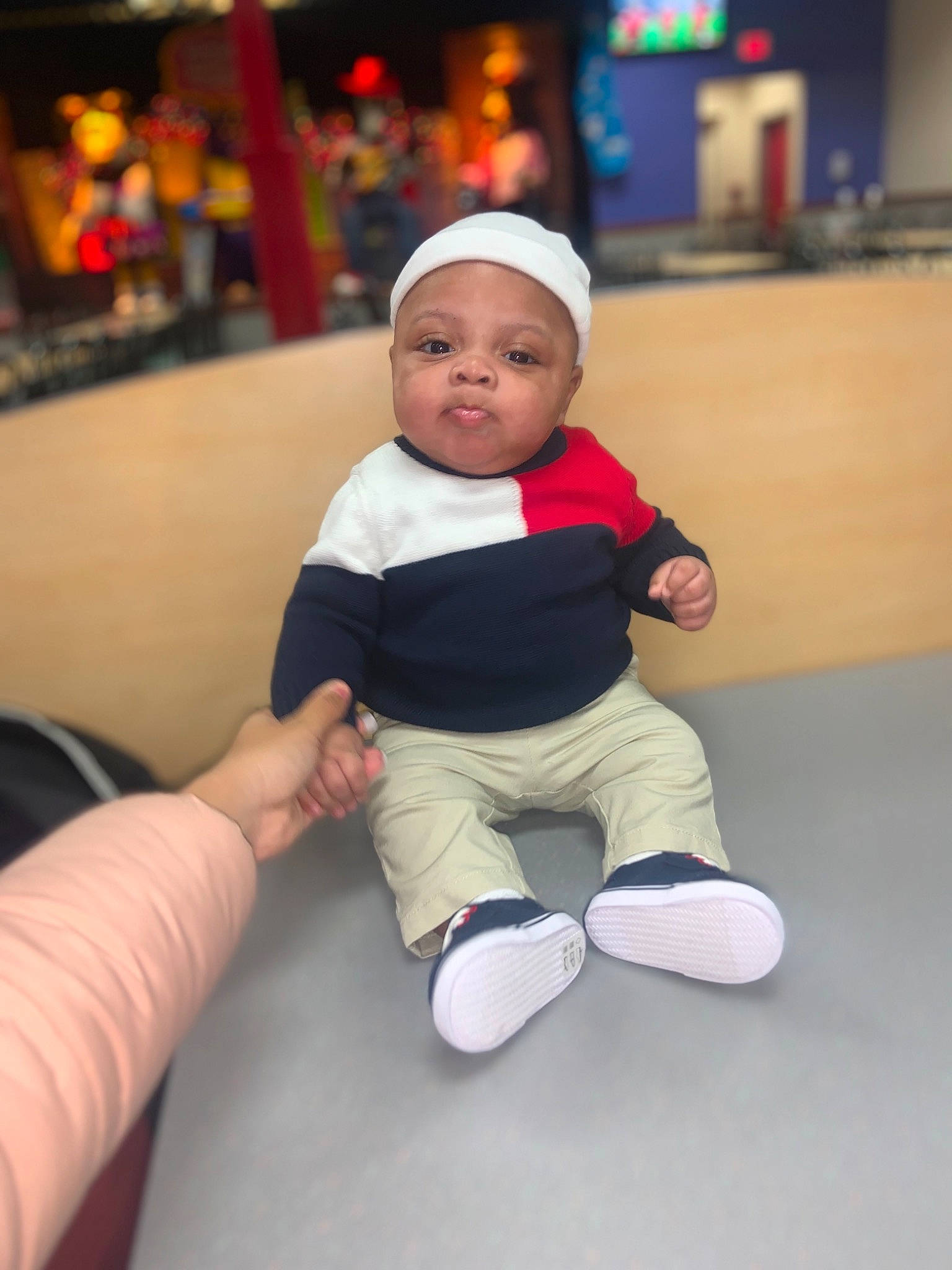 Ahmir joined the competition — help win amazing prizes! baby, baby_toddler_clothing, child, comfort, event, flooring, foot, fun, happy, hat, human_leg, knee, leisure, person, room, sitting, sleeve, sock, thigh, thumb