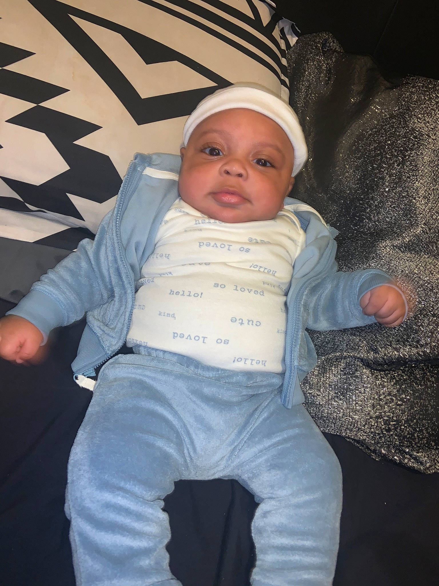 Ahmir joined the competition — help win amazing prizes! baby, baby_products, baby_toddler_clothing, cap, cheek, child, comfort, electric_blue, fashion_accessory, flash_photography, fun, happy, headwear, human_body, knit_cap, person, personal_protective_equipment, sitting, skin, sleeve