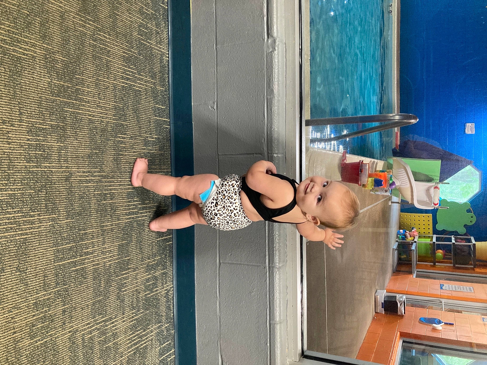 Brynn joined the competition — help win amazing prizes! baby, baby_toddler_clothing, barefoot, child, electric_blue, foot, fun, human_leg, joy, leisure, person, recreation, room, sandal, shoulder, smile, thigh, toddler, vacation, water
