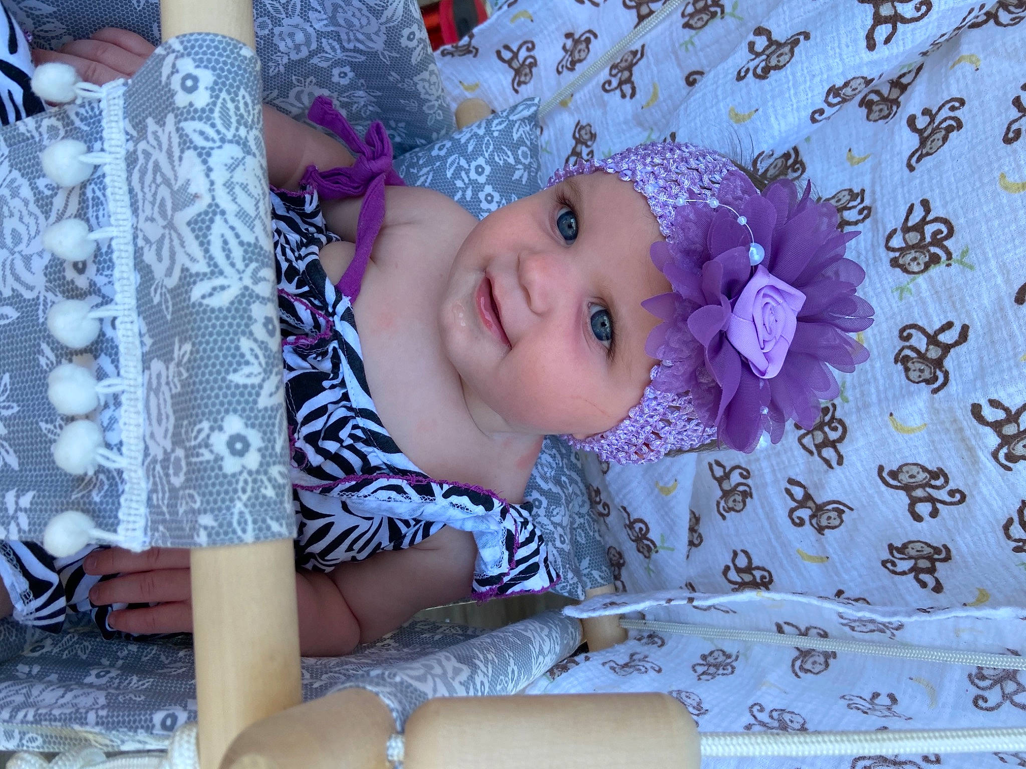 Arabella Rose F joined the competition — help win amazing prizes! baby_toddler_clothing, cheek, child, eyelash, facial_expression, fashion, fashion_accessory, flower, happy, headwear, iris, lip, pattern, person, petal, pink, purple, skin, smile, textile