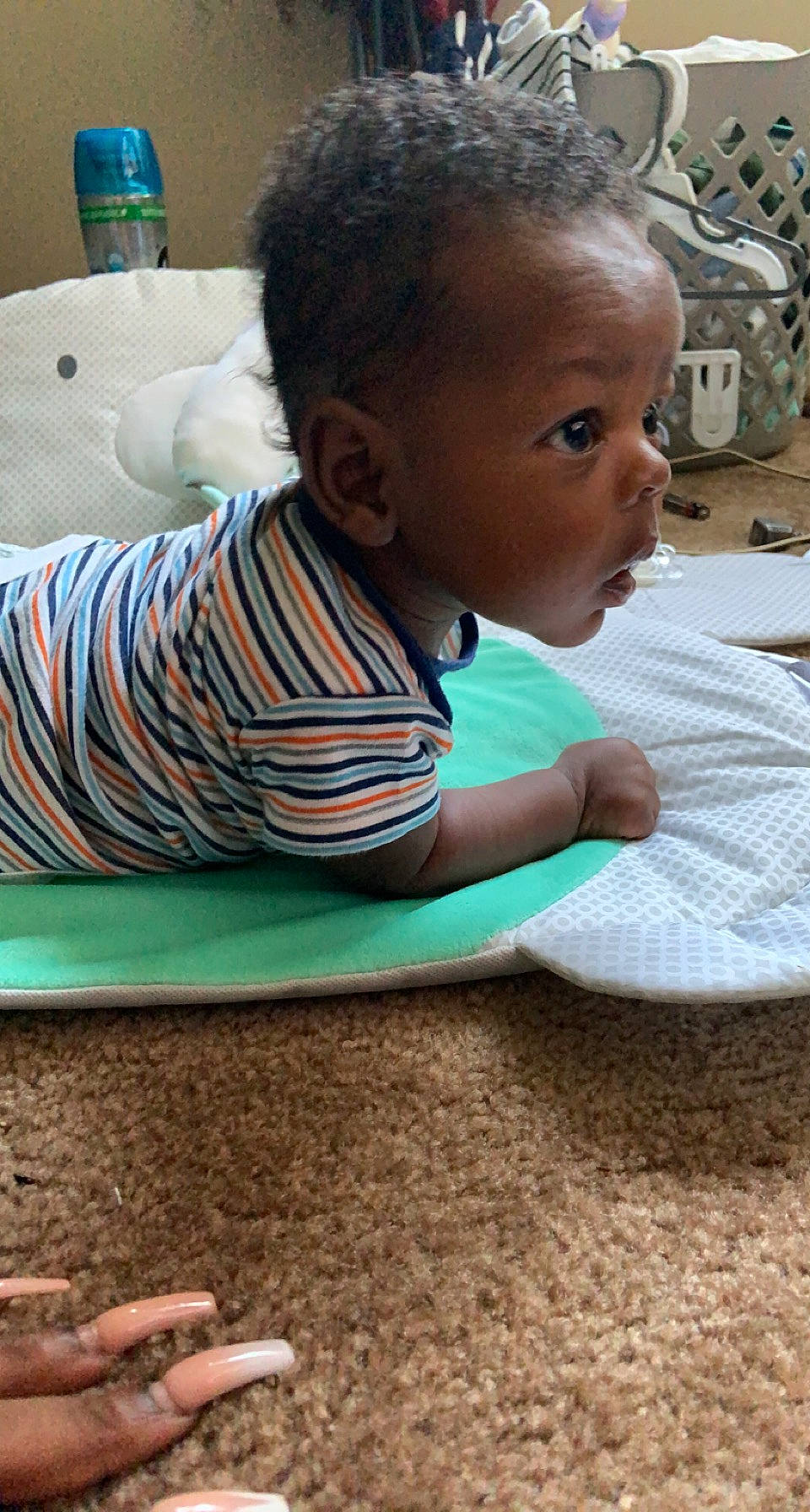 Jair joined the competition — help win amazing prizes! baby, baby_toddler_clothing, blue, cheek, child, eye, face, flooring, hair, hairstyle, happy, head, nose, person, sitting, skin, sleeve, smile, t_shirt, toddler