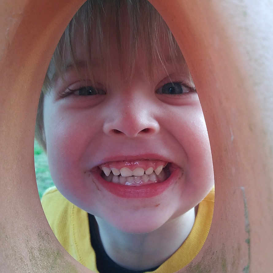 Kieran is registered to the contest to win money with this photo: cheek, child, chin, face, facial_expression, fun, happy, head, human_body, jaw, laugh, lip, mouth, nose, organ, skin, smile, tongue, tooth