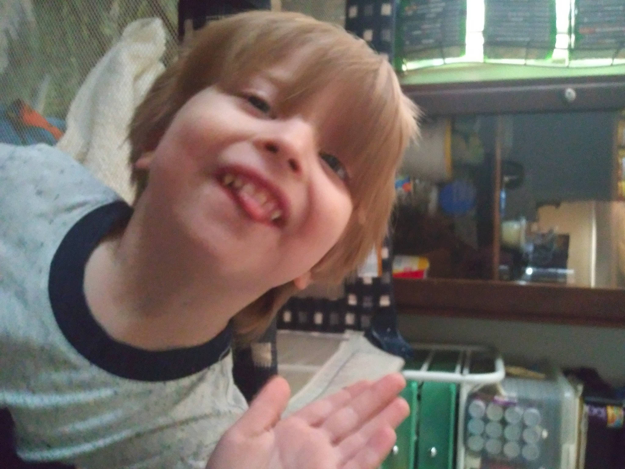 Kieran is registered to the contest to win money with this photo: finger, jaw, joy, mouth, person, smile, thumb