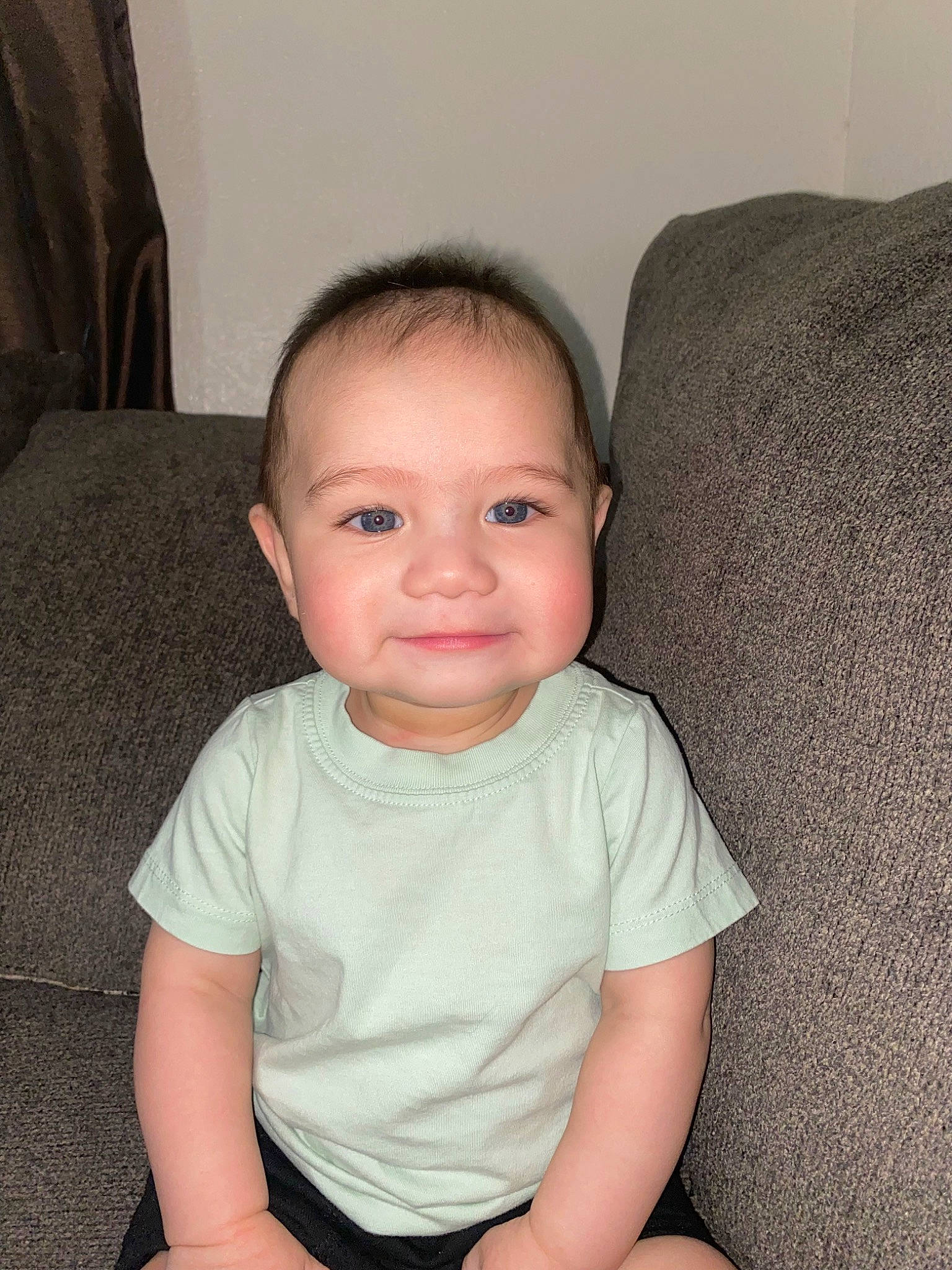 Azaiah joined the competition — help win amazing prizes! baby_toddler_clothing, cheek, chest, child, comfort, couch, elbow, eye, eyebrow, eyelash, human_leg, iris, joy, lip, neck, nose, person, sitting, skin, sleeve