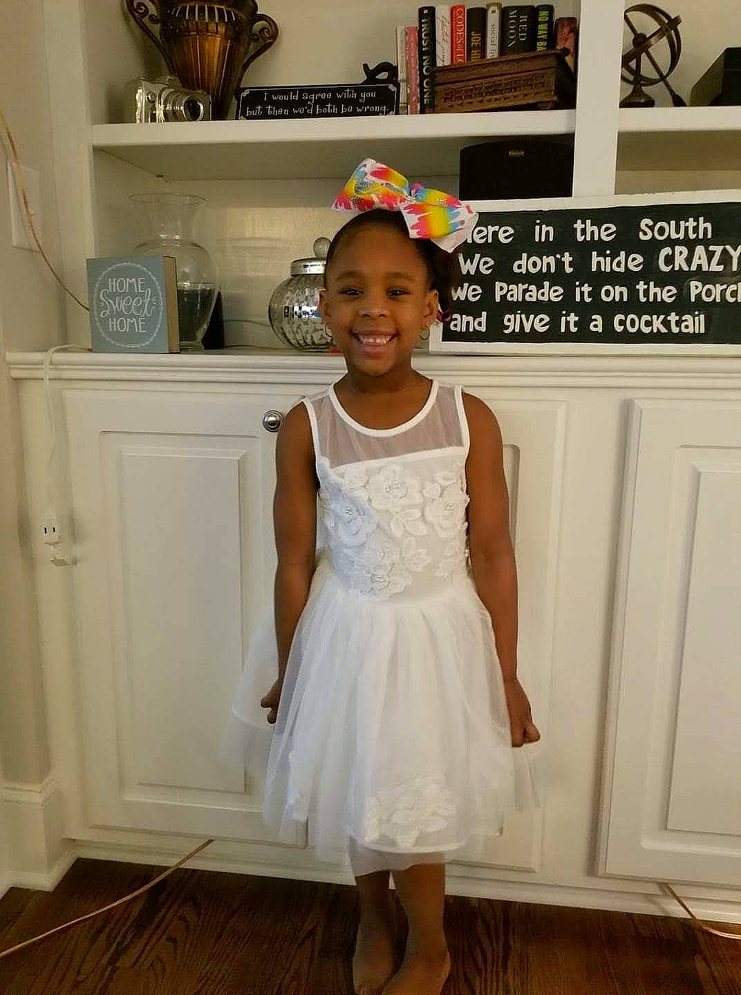 Patience is registered to the contest to win money with this photo: baby_toddler_clothing, bridal_party_dress, ceremony, child, clothing, costume, dress, flower_girl, formal_wear, hair_accessory, headpiece, joy, person, toddler, white