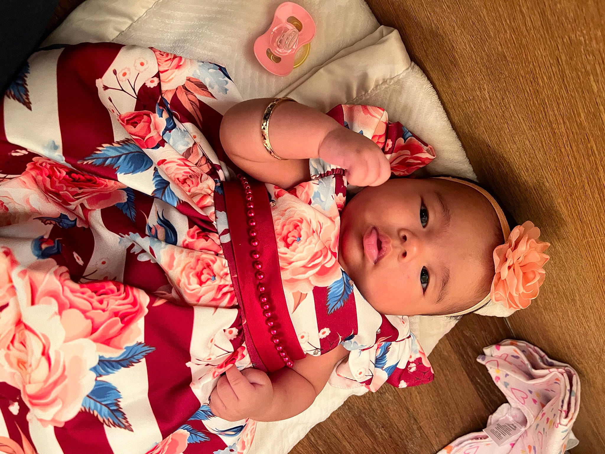 Alaïa is registered to the contest to win money with this photo: arm, baby, baby_sleeping, baby_toddler_clothing, cheek, comfort, eyelash, finger, hand, happy, human, human_body, lip, mouth, nail, pattern, person, pink, skin, sleeve