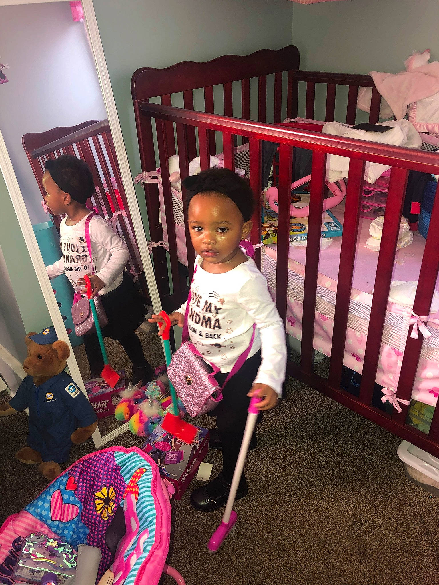 Miranda is registered to the contest to win money with this photo: baby, baby_safety, baby_toddler_clothing, black, child, cradle, design, door, flooring, fun, happy, magenta, person, pink, product, shorts, sleeve, snapshot, t_shirt, toddler