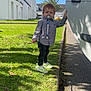 Eliano a rejoint le concours — aidez-le/la à gagner de superbes lots ! toddler, child, pacifier, grass, sidewalk, car, stick, blue_sky, clouds, white_houses, green_grass, casual_clothing, outdoor, daylight, shoes, curb, shadow, tree, person, young_child