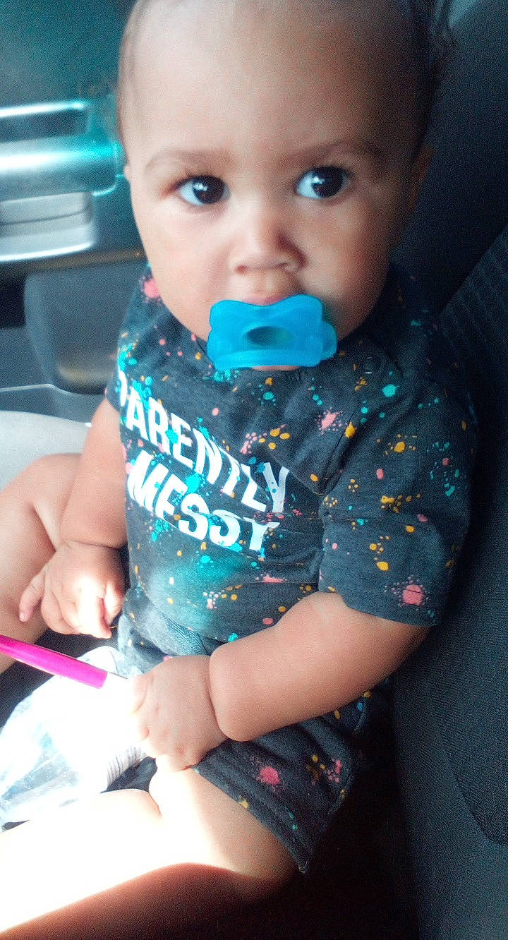 Jayden is registered to the contest to win money with this photo: baby_toddler_clothing, beard, cheek, chest, dress, eye, eyebrow, eyelash, finger, happy, leg, lip, mouth, neck, nose, organ, person, skin, sleeve, t_shirt