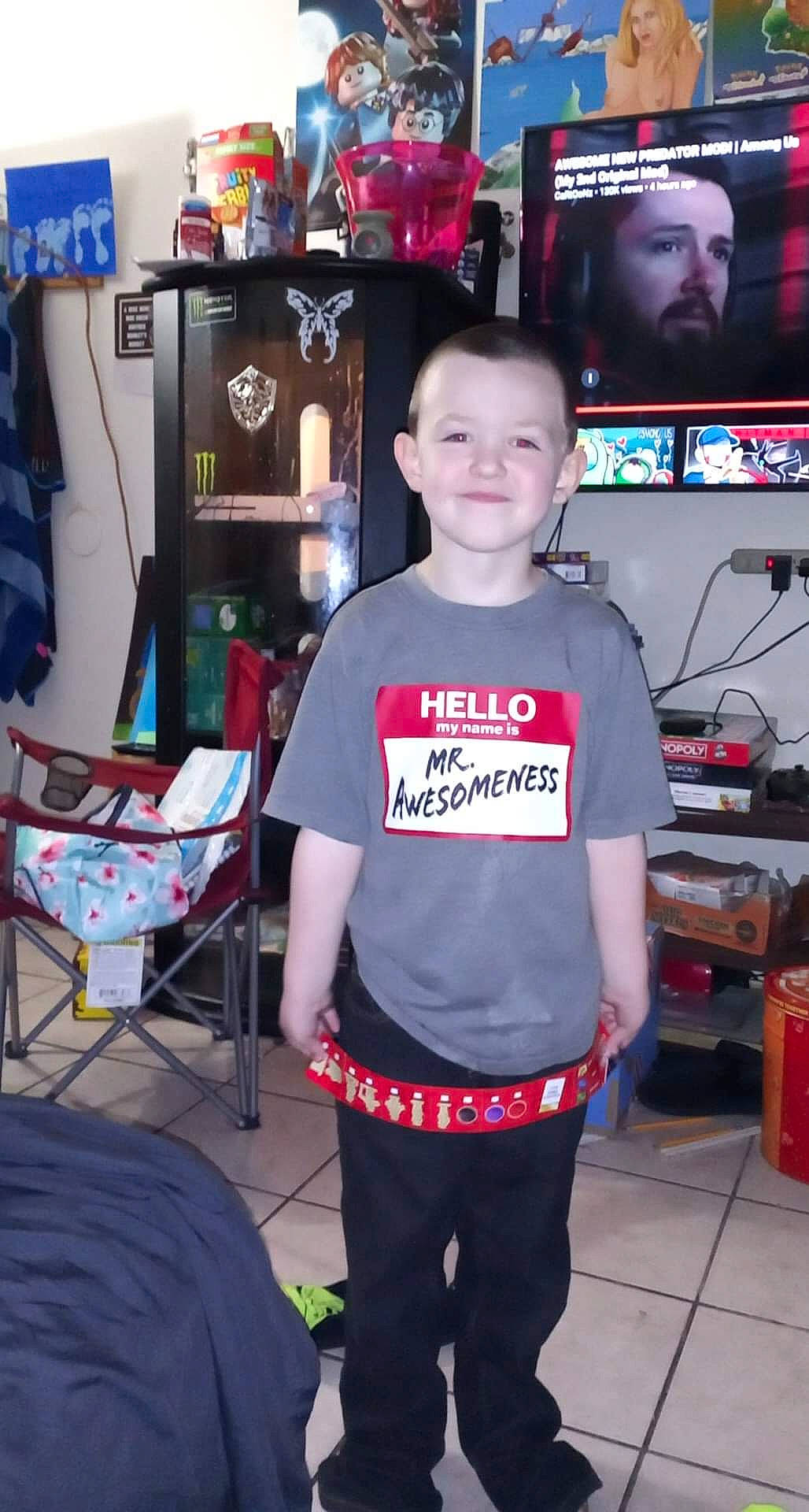 Frederick joined the competition — help win amazing prizes! belt, chair, child, electronic_device, event, fun, furniture, games, headwear, joy, machine, person, recreation, room, shoulder, smile, sportswear, standing, t_shirt, table