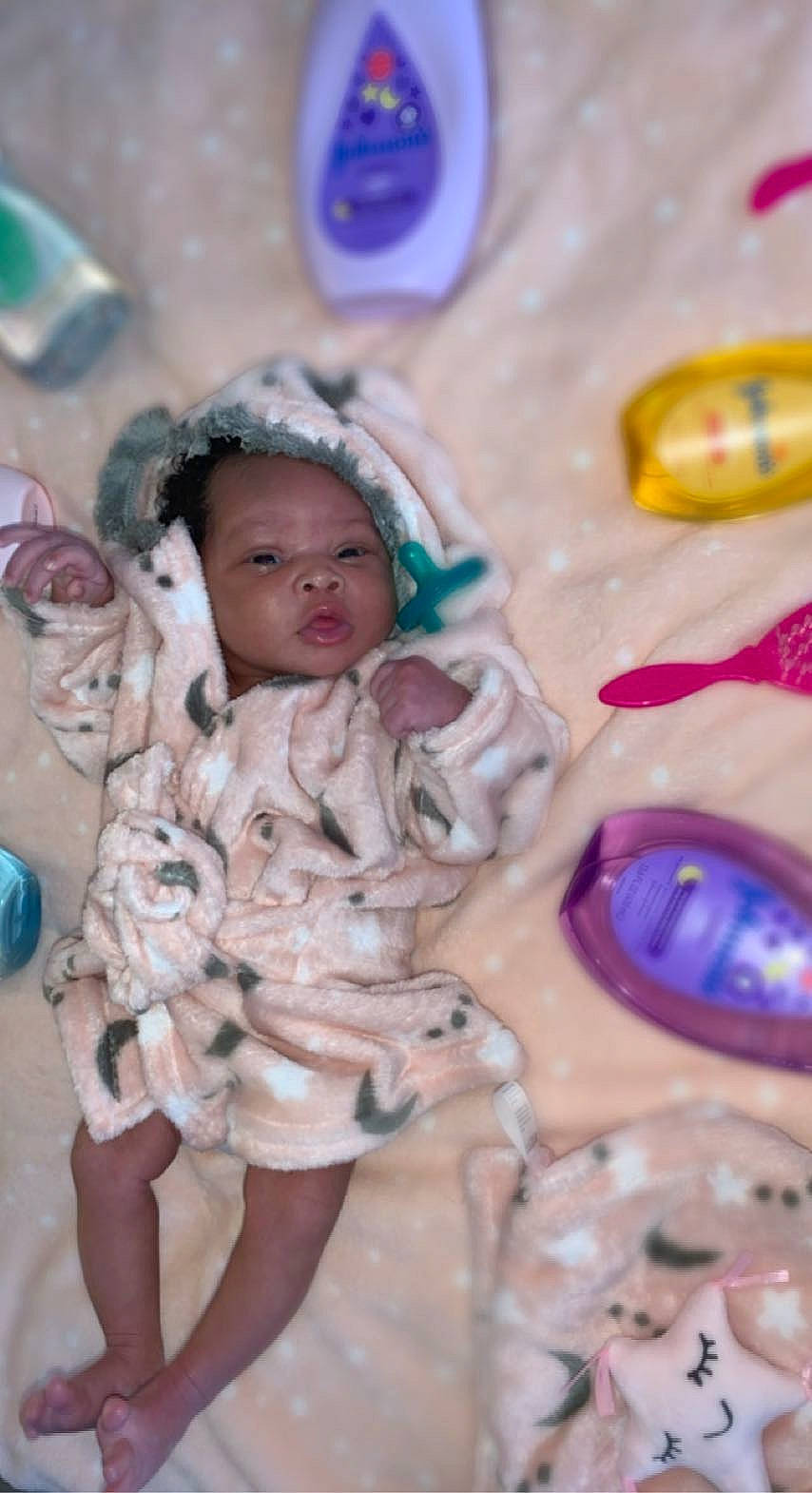 Kailani is registered to the contest to win money with this photo: baby, beauty, cheek, child, event, eye, facial_expression, fun, happy, head, human, human_body, leisure, pattern, person, pink, recreation, skin, textile, toddler