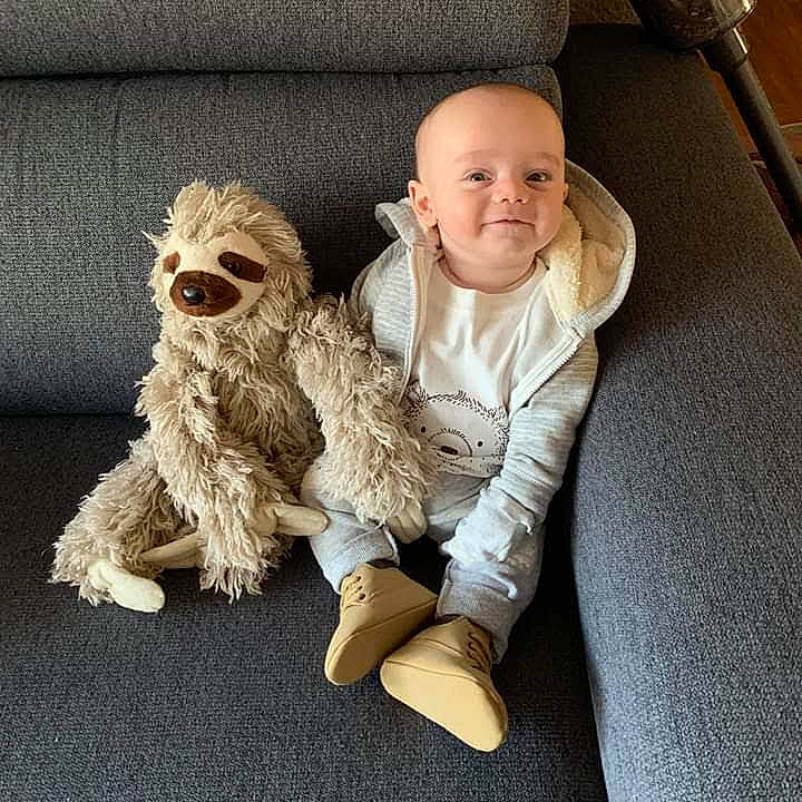 Kacen joined the competition — help win amazing prizes! baby, canidae, child, cockapoo, family, fur, glasses, goldendoodle, labradoodle, leg, people, person, shoe, sitting, toddler