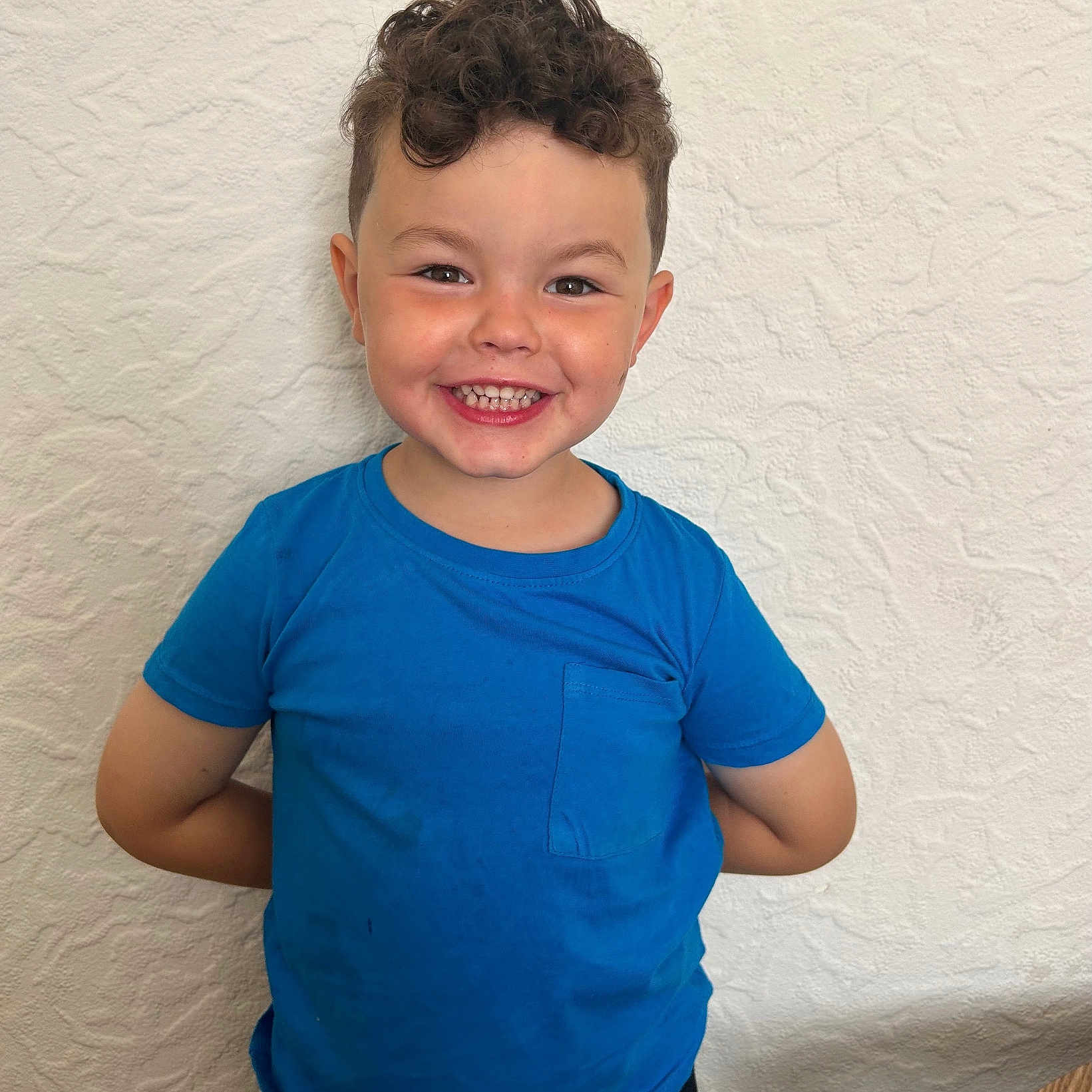 Jaxson is registered to the contest to win money with this photo: bodypart, boy, child, clothing, face, hair, happy, head, laughing, male, mouth, pants, person, photography, portrait, shirt, sleeve, smile, t_shirt, teeth