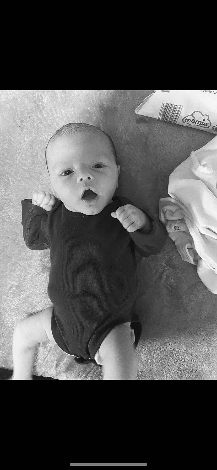 Jaxson joined the competition — help win amazing prizes! baby, baby_toddler_clothing, black_and_white, cheek, child, cool, facial_expression, finger, flash_photography, happy, iris, lip, monochrome, monochrome_photography, mouth, person, sitting, sleeve, style, t_shirt
