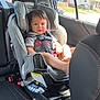 Xavier joined the competition — help win amazing prizes! toddler, child, car_seat, vehicle_interior, seatbelt, window, sunlight, car, gray, seat, child_safety, baby, person, indoors, daylight, urban, residential_area, headrest, casual_clothing, seat_belt