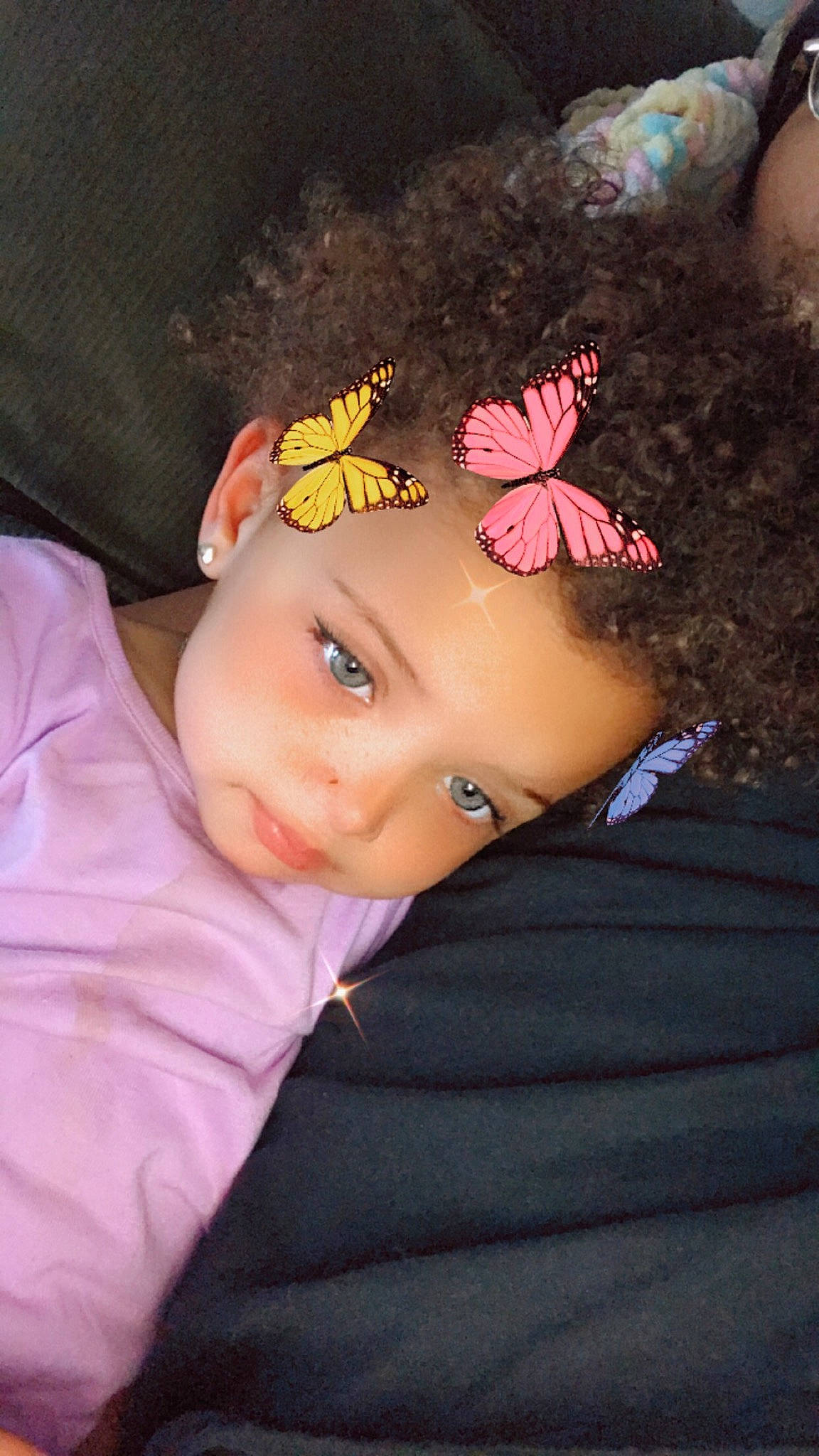 Jalaya is registered to the contest to win money with this photo: baby_toddler_clothing, black_hair, butterfly, cap, child, eyelash, hair_accessory, hat, headband, headgear, headpiece, iris, lip, magenta, neck, person, petal, pink, plant, skin