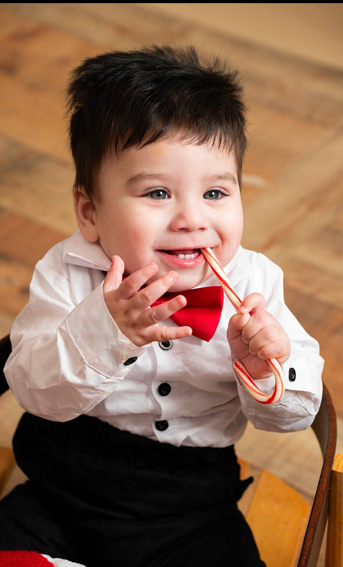 Ace Delles is registered to the contest to win money with this photo: baby, baby_toddler_clothing, cheek, child, collar, dress_shirt, event, finger, flash_photography, formal_wear, fun, gesture, happy, joy, nose, person, skin, sleeve, smile, thumb