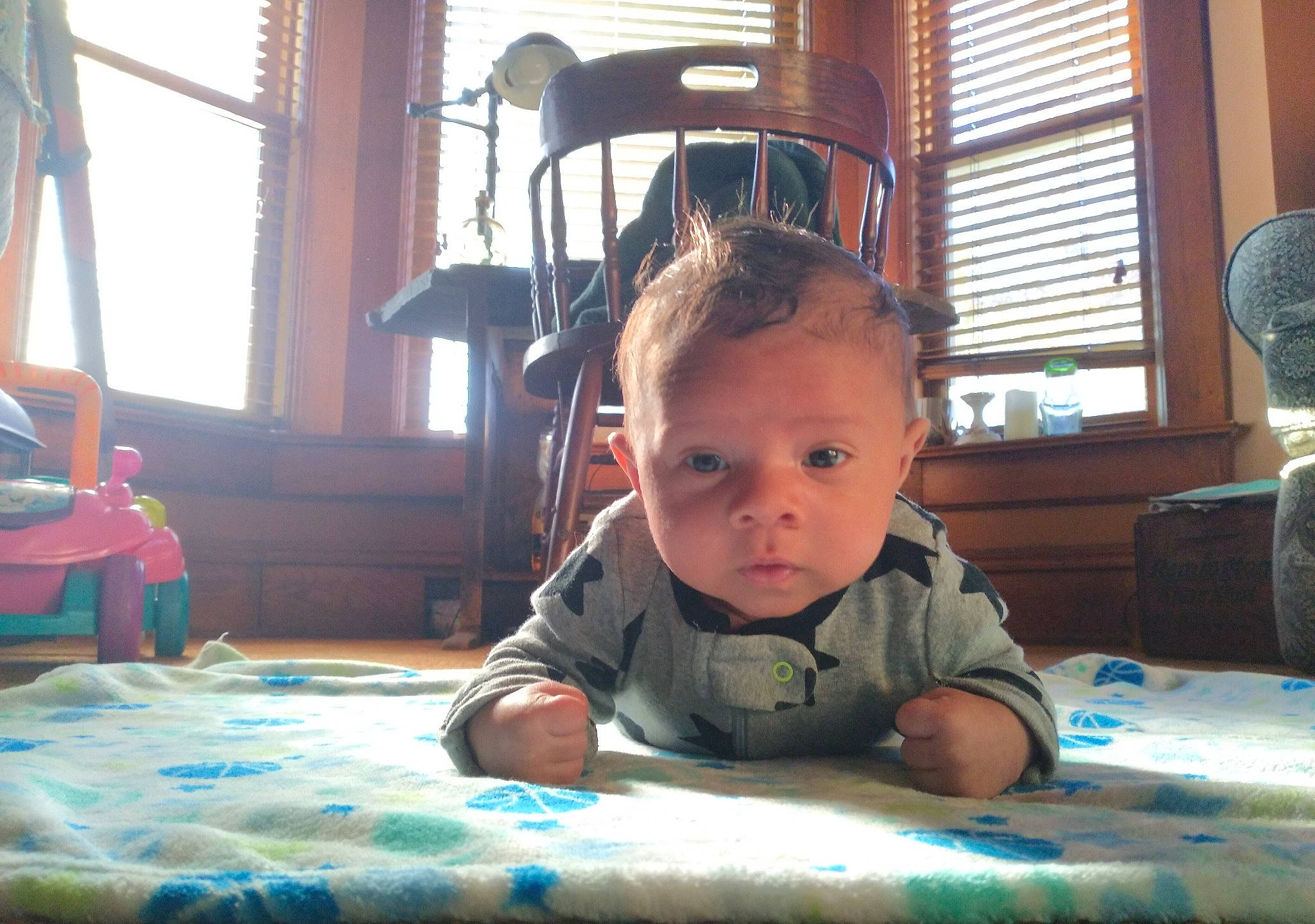 Deandre is registered to the contest to win money with this photo: baby, cheek, child, eye, face, forehead, fun, head, leisure, nose, person, play, room, sitting, skin, smile, toddler, tummy_time, vacation