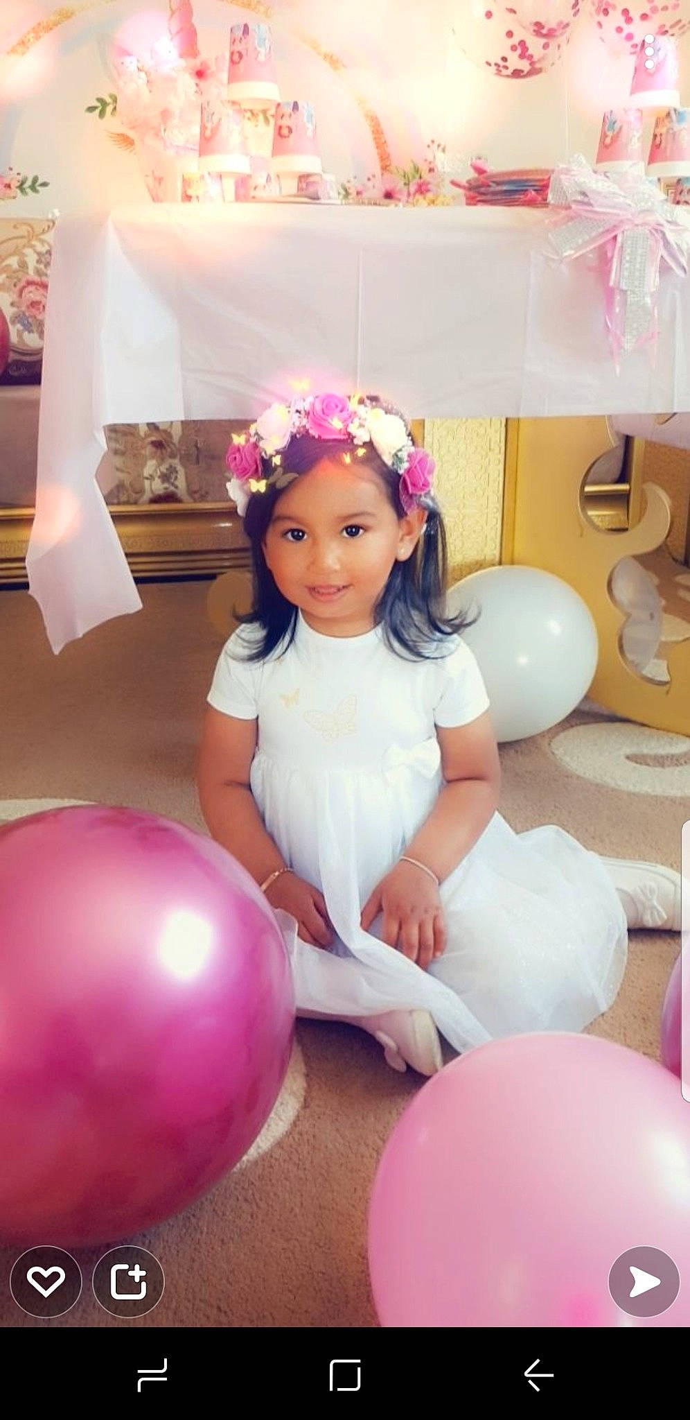 Amira participe au concours pour gagner de l'argent avec cette photo : balloon, beauty, child, dress, event, face, facial_expression, flower, fun, hairstyle, happy, joy, magenta, party_supply, person, pink, purple, smile, thigh, toddler