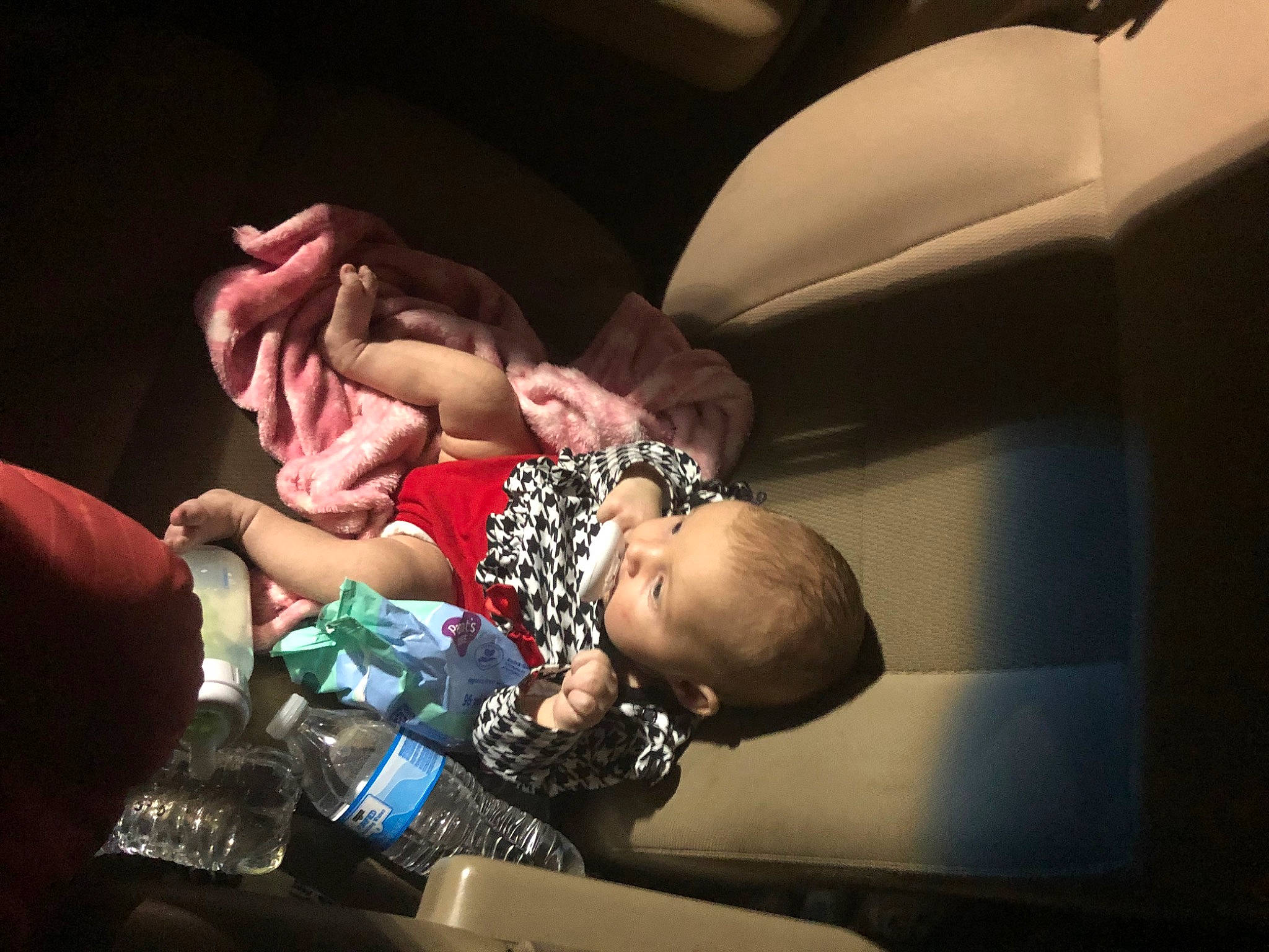 Rebecca is registered to the contest to win money with this photo: abdomen, baby, comfort, couch, darkness, elbow, entertainment, event, flash_photography, flesh, fun, hand, human_leg, nail, performance, performing_arts, person, sitting, thigh, toddler