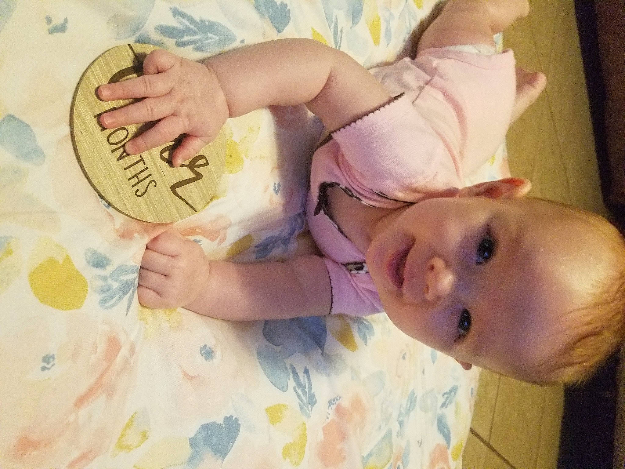 Emmaline is registered to the contest to win money with this photo: arm, baby, baby_safety, baby_toddler_clothing, beauty, cheek, child, circle, eye, finger, gesture, hand, happy, head, human_body, person, skin, thumb, toddler, white