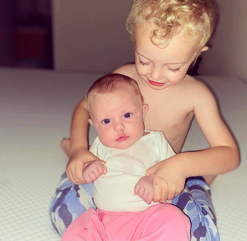 Brayleigh joined the competition — help win amazing prizes! arm, baby_toddler_clothing, cheek, face, hair, hairstyle, hand, happy, human_body, iris, joint, mouth, muscle, neck, nose, organ, person, shoulder, skin, sleeve