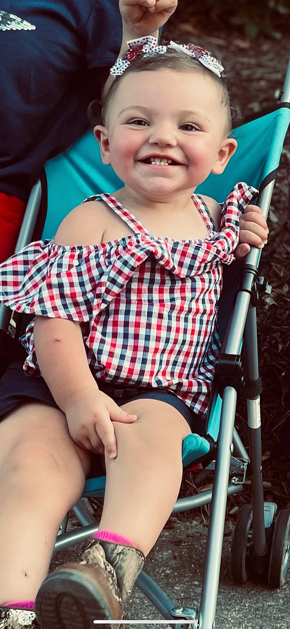 Raven is registered to the contest to win money with this photo: baby_toddler_clothing, black, blue, cheek, chin, eye, facial_expression, hairstyle, happy, head, human, iris, joy, lip, organ, person, photograph, shorts, skin, smile