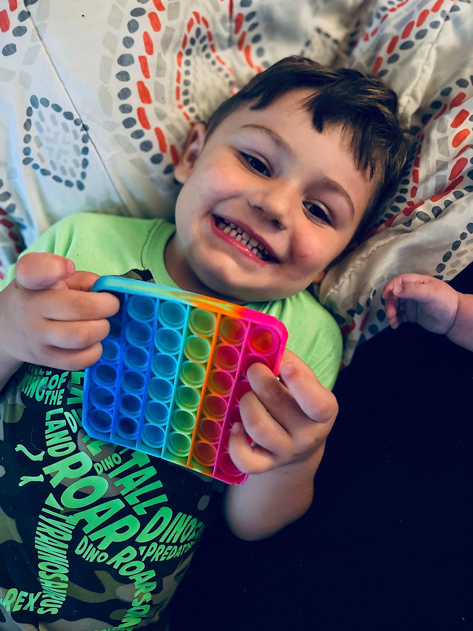 Brandon joined the competition — help win amazing prizes! child, cool, finger, fun, gesture, grass, hand, happy, holiday, joy, laugh, linens, nail, pattern, person, play, sitting, sleeve, smile, t_shirt