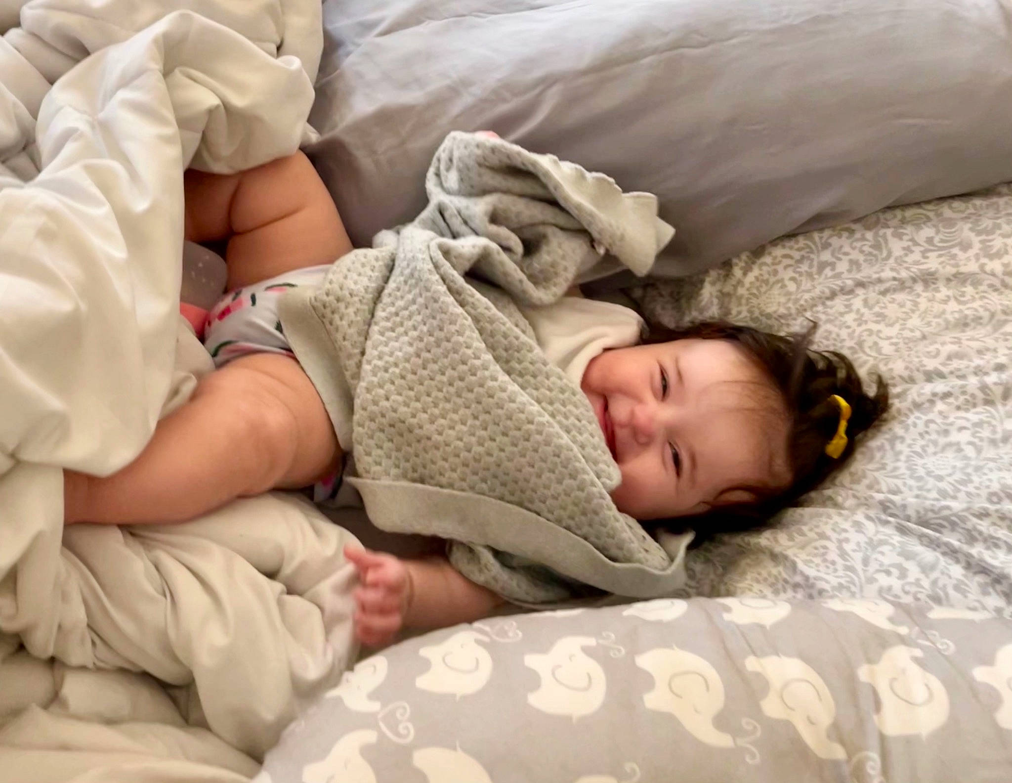Jamila joined the competition — help win amazing prizes! baby_sleeping, bed_sheet, bedding, bedtime, child, comfort, couch, elbow, human_leg, linens, nap, pattern, person, room, skin, sleep, sleeve, textile, thigh, toddler