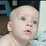 Shaddai participe au concours pour gagner de l'argent avec cette photo : baby, child, infant, blue_eyes, bare_skin, blanket, curious, face, head, lying_down, looking_up, mouth_open, person, portrait, skin, soft_texture, tender, young, indoors, cute