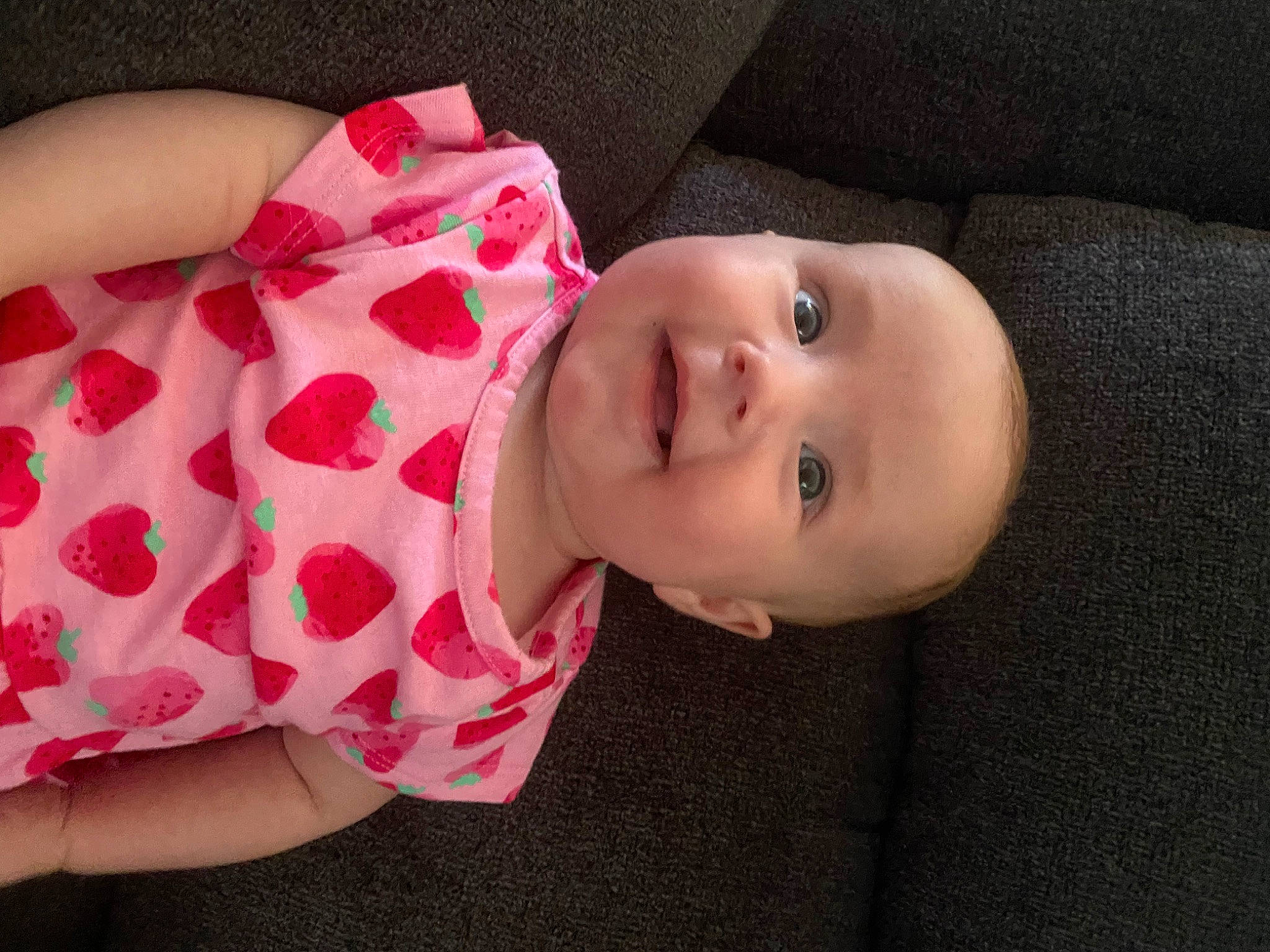 Oaklynn is registered to the contest to win money with this photo: baby, baby_toddler_clothing, cheek, child, eye, eyelash, happy, head, human_body, human_leg, joy, lip, magenta, mouth, nose, pattern, person, skin, sleeve, smile