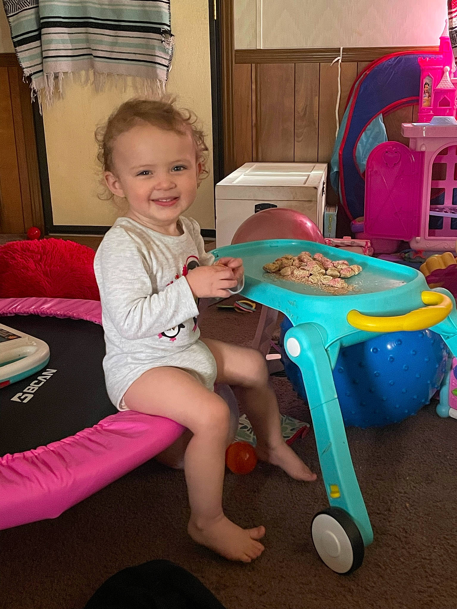 Scarlet is registered to the contest to win money with this photo: chair, child, event, fun, furniture, human_body, human_leg, joy, knee, lap, leisure, party, person, pink, play, sharing, sitting, smile, standing, table