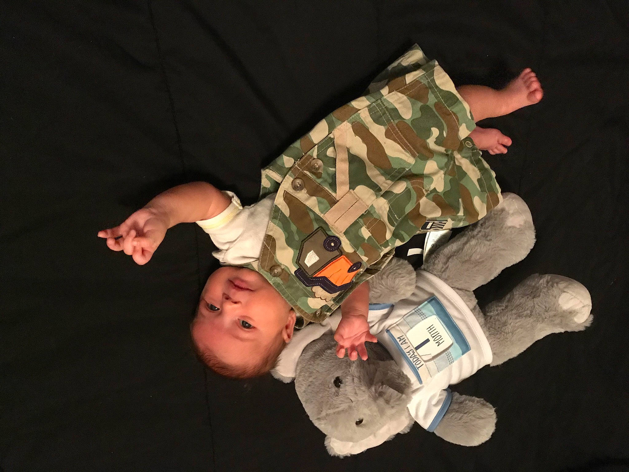 Remington joined the competition — help win amazing prizes! baby, camouflage, child, fun, gesture, military_camouflage, person, soldier, space, toddler