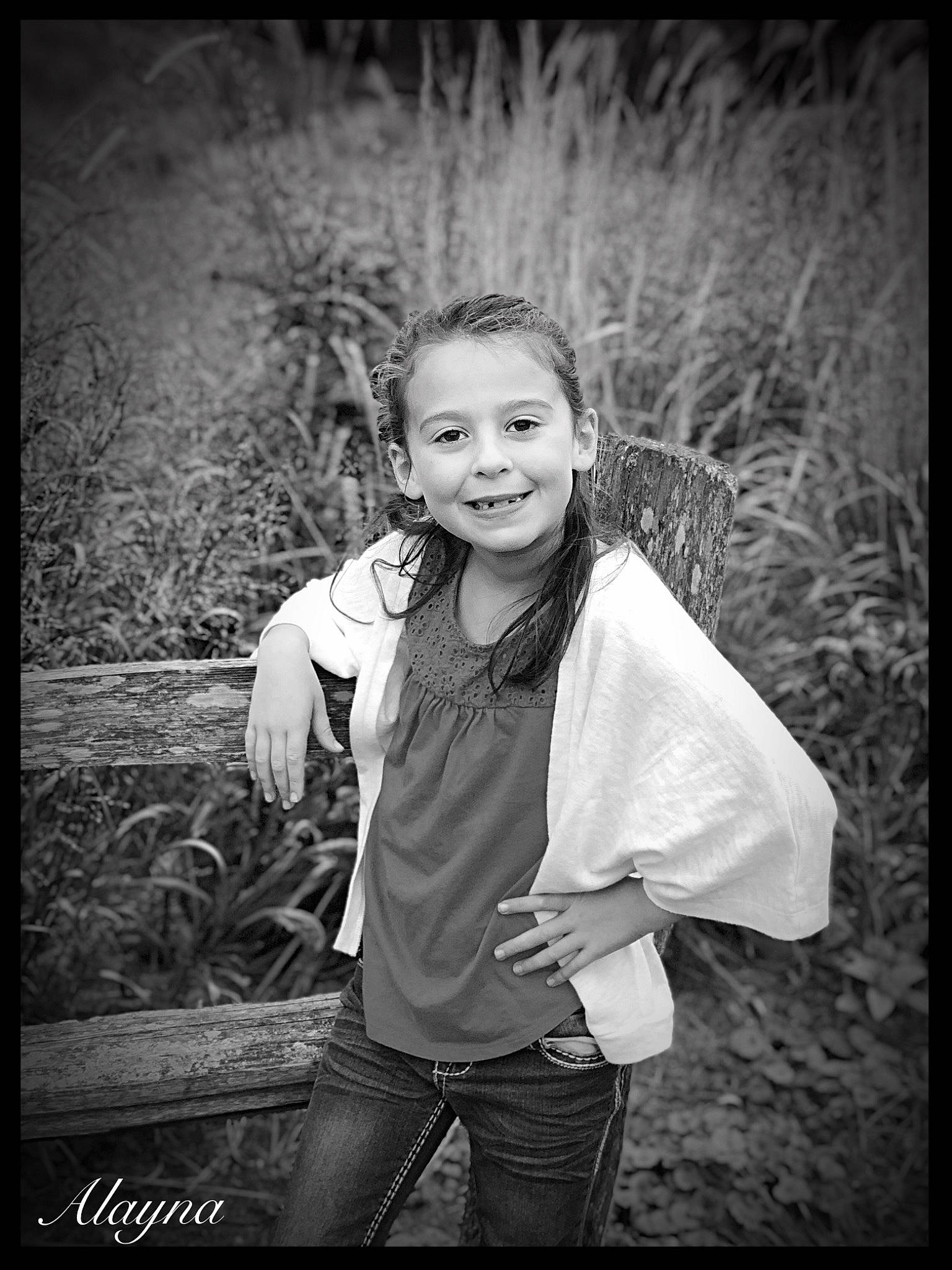 Alayna is registered to the contest to win money with this photo: black, black_and_white, child, child_model, eye, face, facial_expression, flash_photography, grass, joy, monochrome, monochrome_photography, people, people_in_nature, person, photograph, photography, portrait, portrait_photography, smile