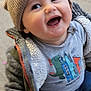 baby, casual_wear, child, coat, cute, eyes, face, happy, hat, infant, jacket, knitted_hat, open_mouth, outdoor, portrait, sitting, smiling, toddler, warm_clothes, winter_clothing