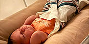 Julianna joined the competition — help win amazing prizes! arms, baby, bassinet, blanket, clothing, comfort, cushion, face, head, indoor, infant, mesh, newborn, peaceful, quiet, resting, skin, sleeping, soft, striped
