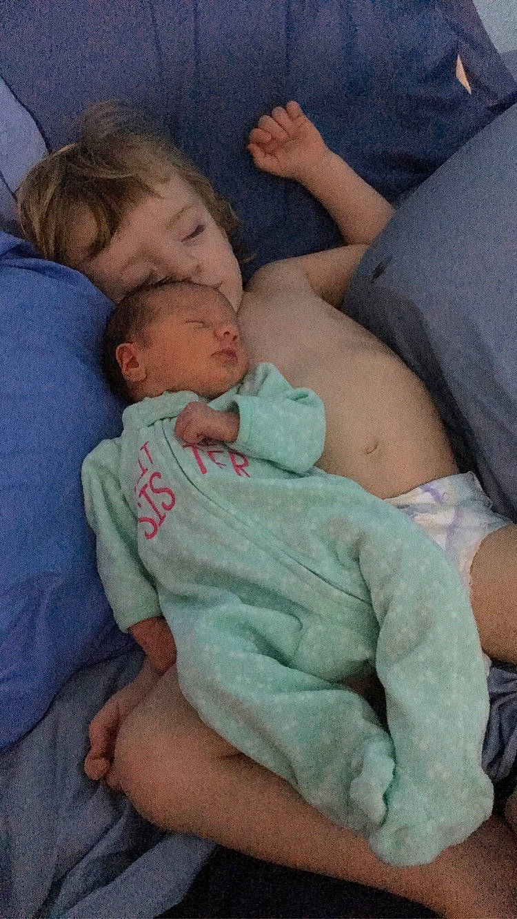 Ryan is registered to the contest to win money with this photo: arm, baby, bedtime, birth, child, childbirth, comfort, gesture, nap, person, sleep, toddler