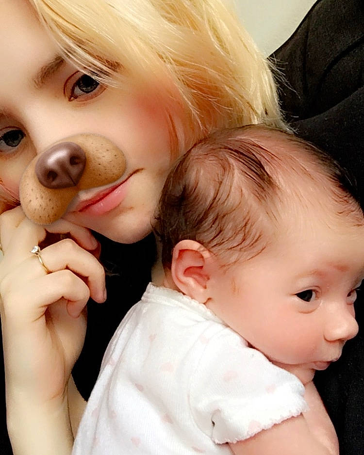 Aurora Anne is registered to the contest to win money with this photo: baby, blond, cheek, child, companion_dog, ear, eye, eyebrow, face, gesture, hair, head, iris, lip, mouth, nose, person, puppy_love, skin, smile