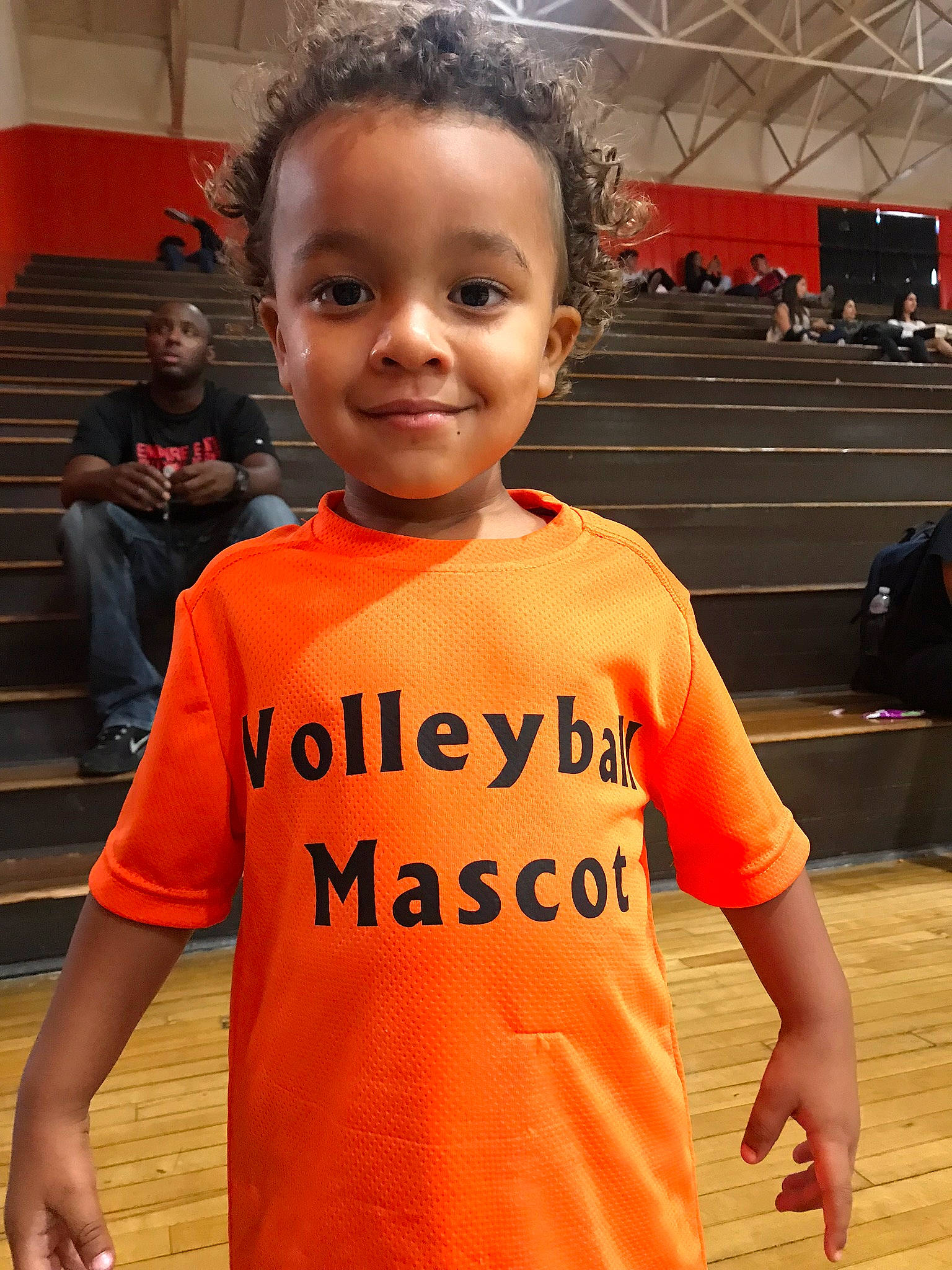 Kavon is registered to the contest to win money with this photo: boy, child, day, fun, girl, joy, orange, person, product, smile, t_shirt, toddler