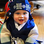 Alec joined the competition — help win amazing prizes! baby, cap, clothing, costume, dress, face, fashion, formalwear, glove, gown, graduation, hardwood, hat, head, people, person, photography, portrait, robe, wood