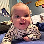 Layla is registered to the contest to win money with this photo: baby, bed, beetlejuice, blanket, blinds, closeup, clothing, cute, dog, face, happy, indoor, infant, person, room, sign, sleeping, tongue_out, wall_decor, window