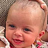 Braelynn joined the competition — help win amazing prizes! baby, child, smiling, face, head, hand, expression, closeup, portrait, colorful_clothing, happy, infant, skin, eyes, cute, person, young, indoors, texture, background