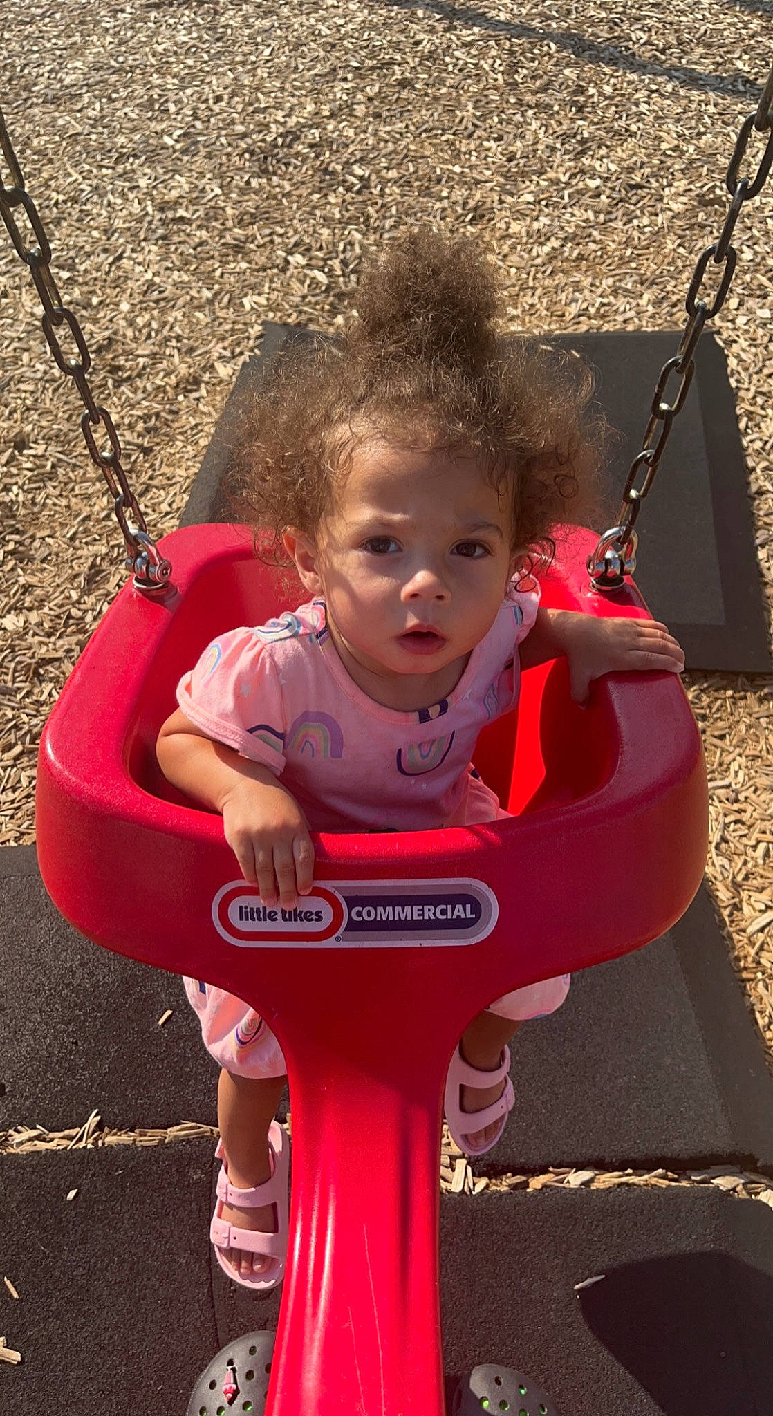 Alayna joined the competition — help win amazing prizes! baby, black, cheek, chin, eye, grass, hair, hairstyle, hand, happy, head, human_body, leaf, leg, lip, person, photograph, product, skin, swing