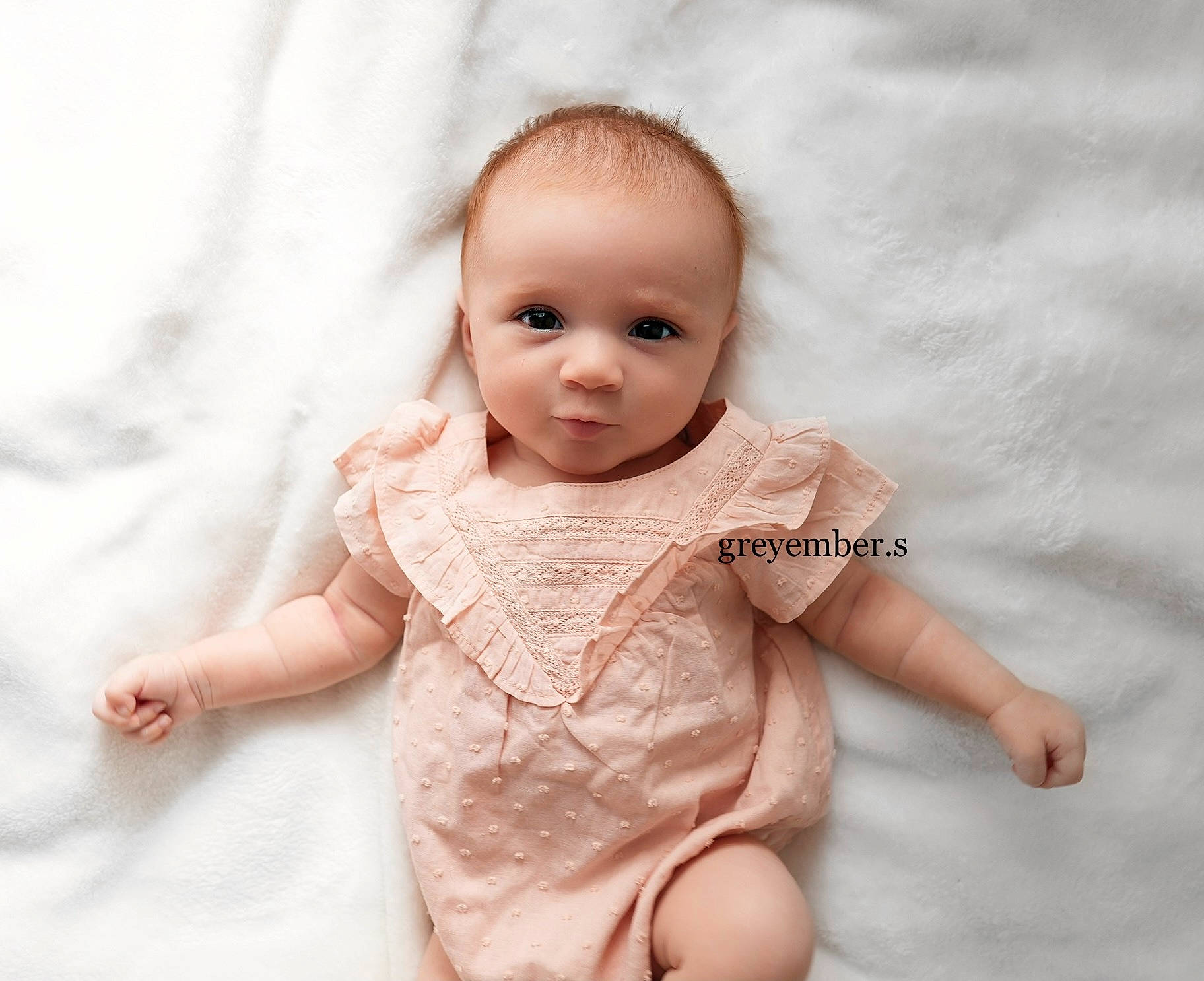 Grey is registered to the contest to win money with this photo: baby, baby_toddler_clothing, cheek, chin, eye, eyebrow, face, finger, gesture, happy, head, iris, lip, nail, nose, pattern, person, skin, sleeve, thumb