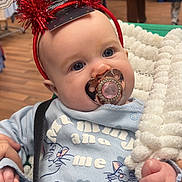Ruby-Ray joined the competition — help win amazing prizes! baby, pacifier, headband, santa, blanket, blue_eyes, clothing, indoor, shopping, store, people, winter_clothing, cute, infant, hand, portrait, holiday, child, smile, warm