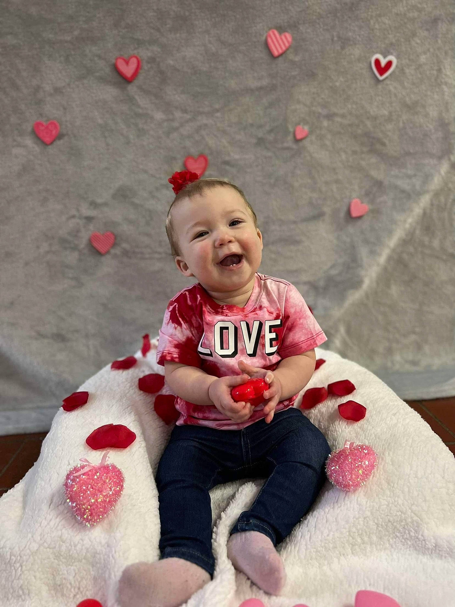 Bryleigh joined the competition — help win amazing prizes! baby, baby_toddler_clothing, carmine, child, christmas_ornament, dress, event, face, fictional_character, fun, happy, hat, head, person, pink, sitting, sleeve, smile, t_shirt, toddler