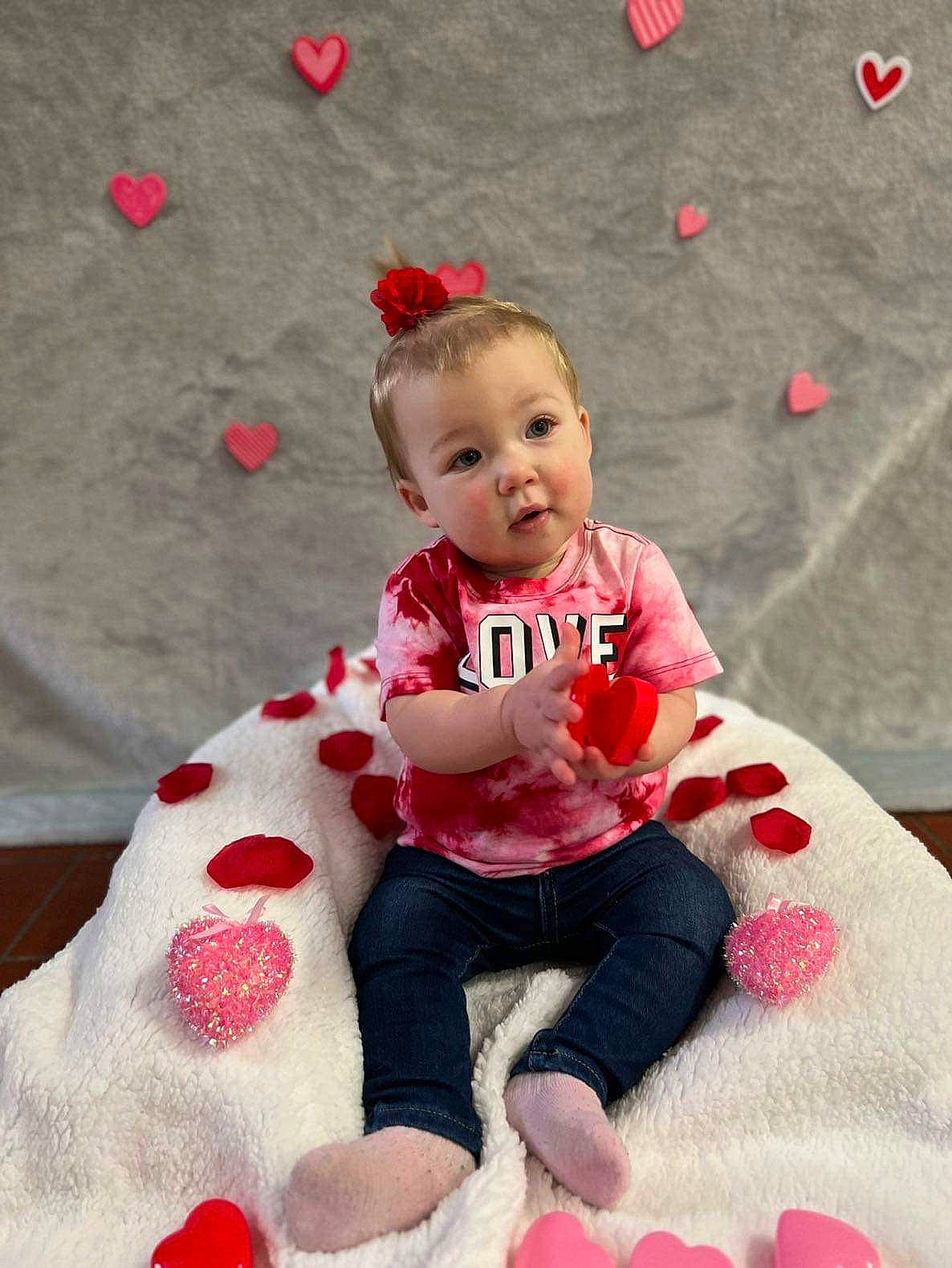 Bryleigh joined the competition — help win amazing prizes! baby, baby_toddler_clothing, carmine, child, christmas_eve, event, face, fun, happy, head, holiday, magenta, pattern, person, pink, red, sitting, skin, sleeve, surprise
